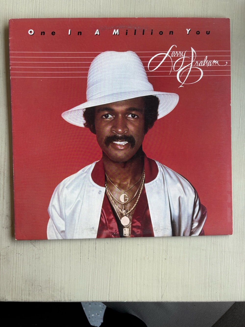 Vintage Portrait with White Hat and Red Background